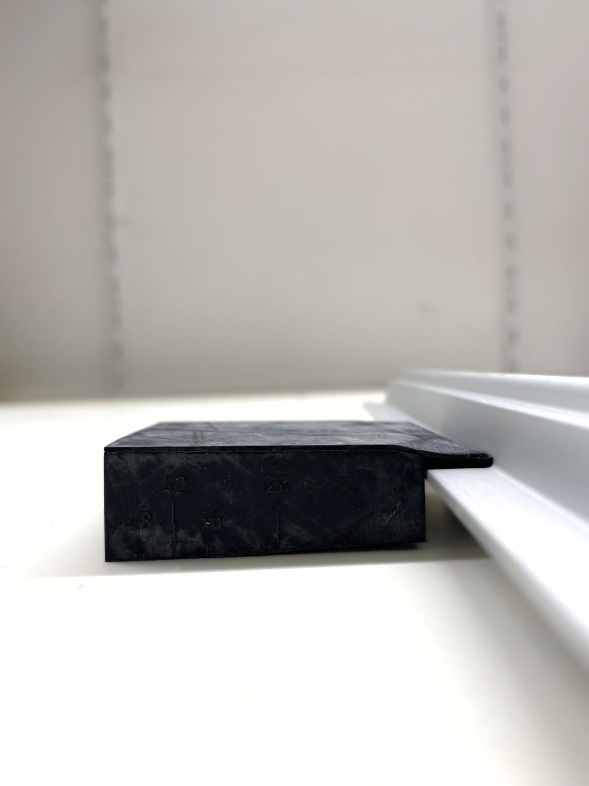 Sliding door rubber block for the sill